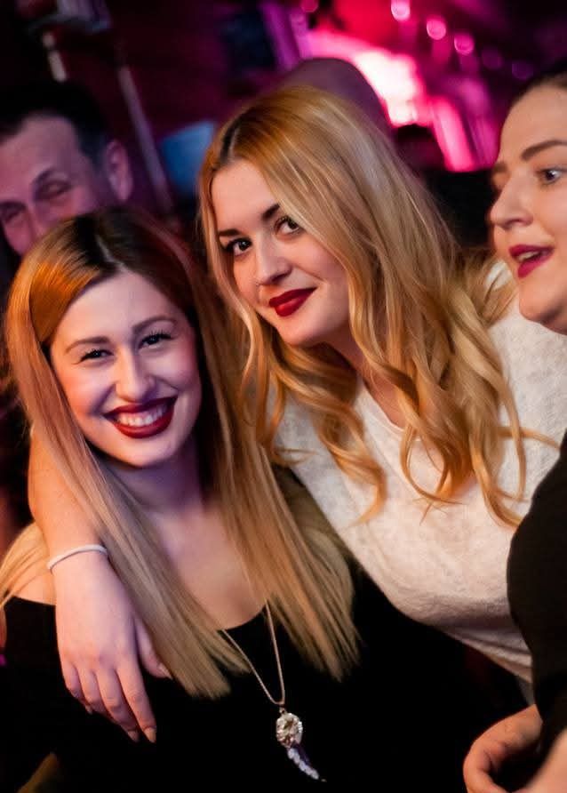 Friends at a Cozy Club party