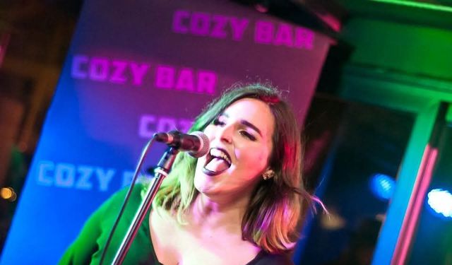 Live singer on stage at Cozy