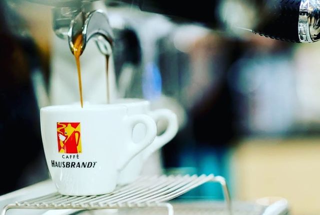 Espresso pouring into a cup at Cozy