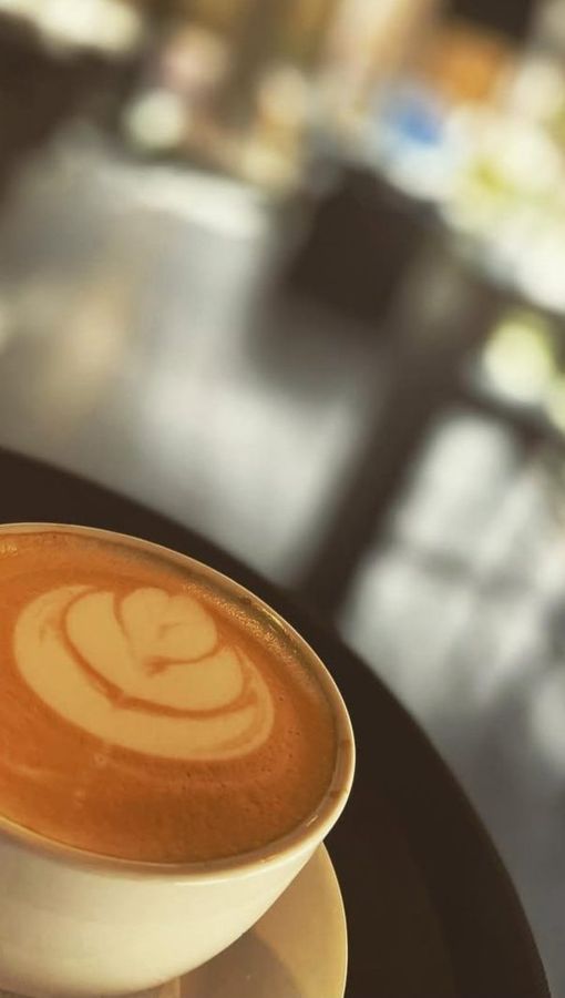 Homemade cappuccino with latte art at Cozy